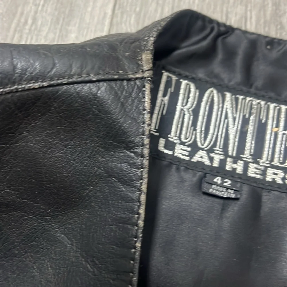 Frontier Leather Men’s Vest w/ the “Harley Davidson” patch on the back. Size 42